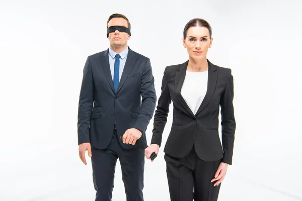 Businessman in blindfold and businesswoman — Stock Photo, Image