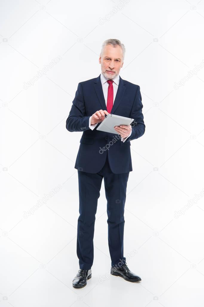 Businessman using digital tablet 