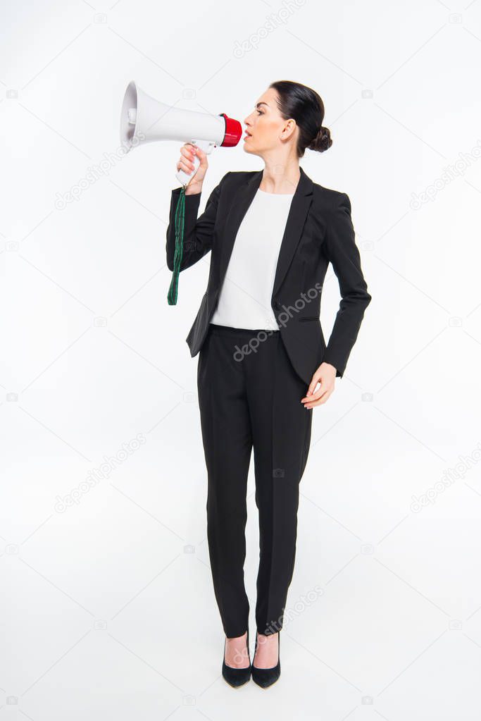 Businesswoman holding megaphone