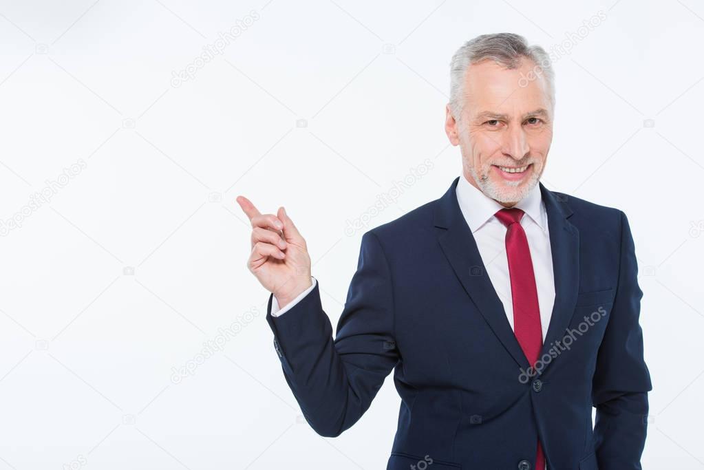 Businessman pointing with finger