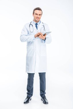 Doctor using digital tablet clipart