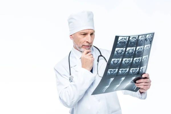 Doctor looking at x-ray — Free Stock Photo