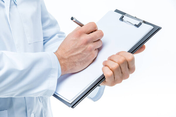 Doctor holding clipboard
