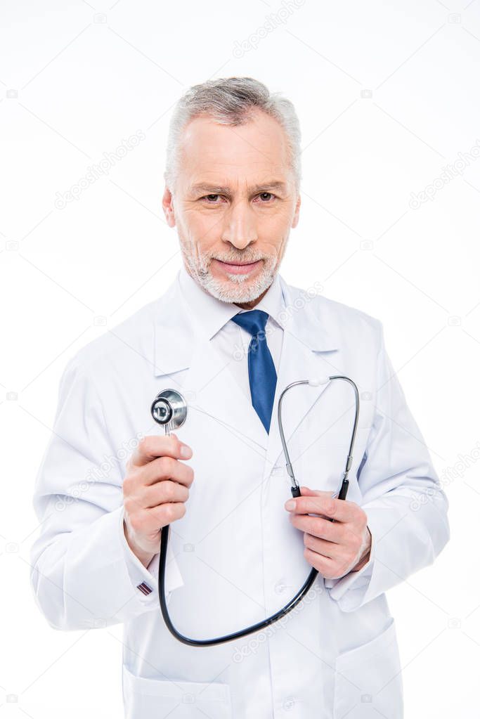 Mature doctor with stethoscope 