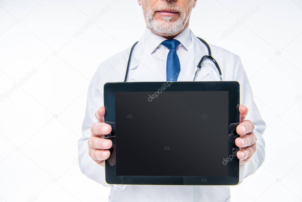 Doctor holding digital tablet
