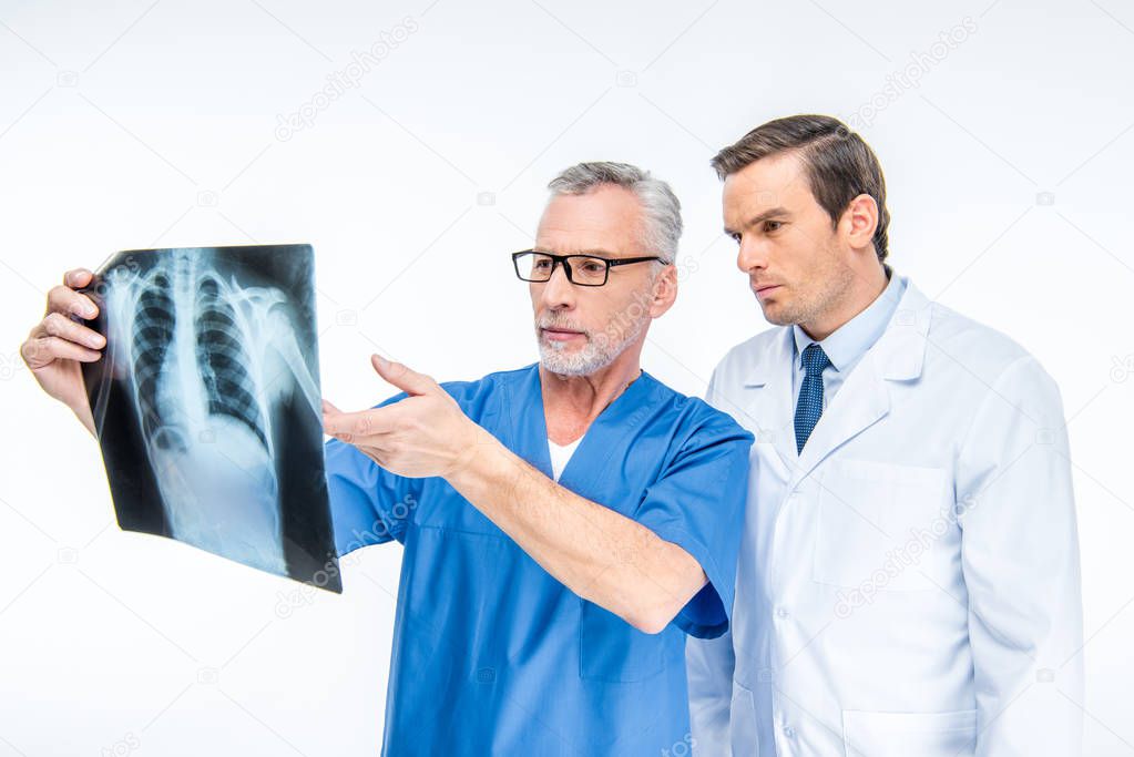 Doctors examining x-ray image