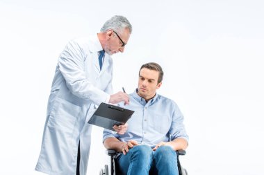 Handicapped man and doctor  clipart