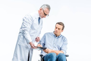Handicapped man and doctor  clipart