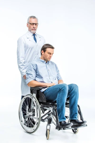 Handicapped man and doctor