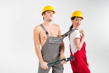 Erkek ve dişi inşaatçılar poz