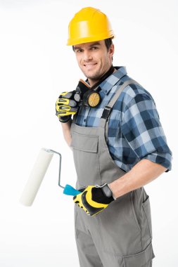 Workman with paint roller    clipart