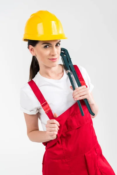 Kvinnlig builder innehav skiftnyckel — Stockfoto