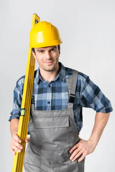 Workman with level tool — Stock Photo, Image