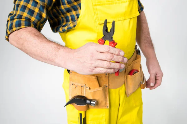 Workman with tool belt — Stock Photo, Image