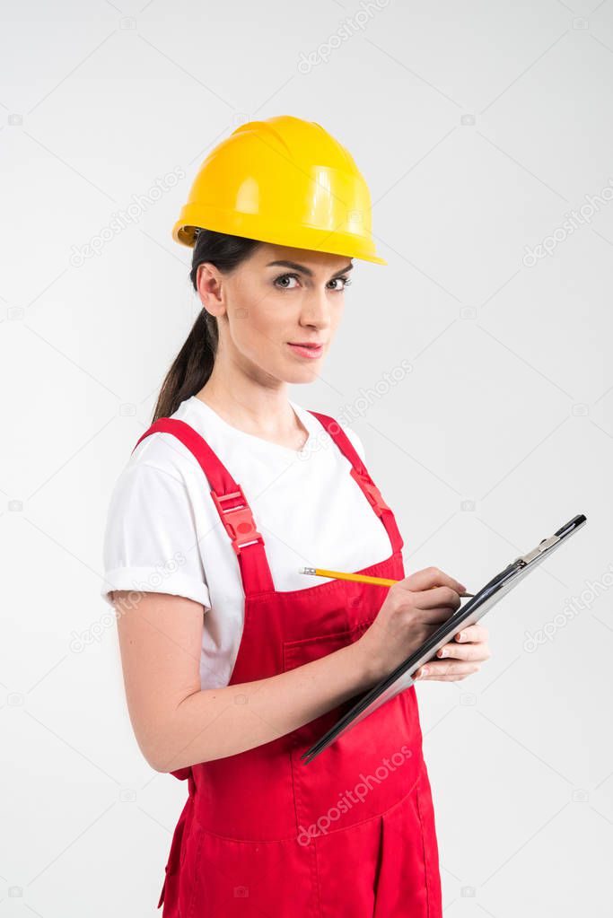 Female engineer in helmet