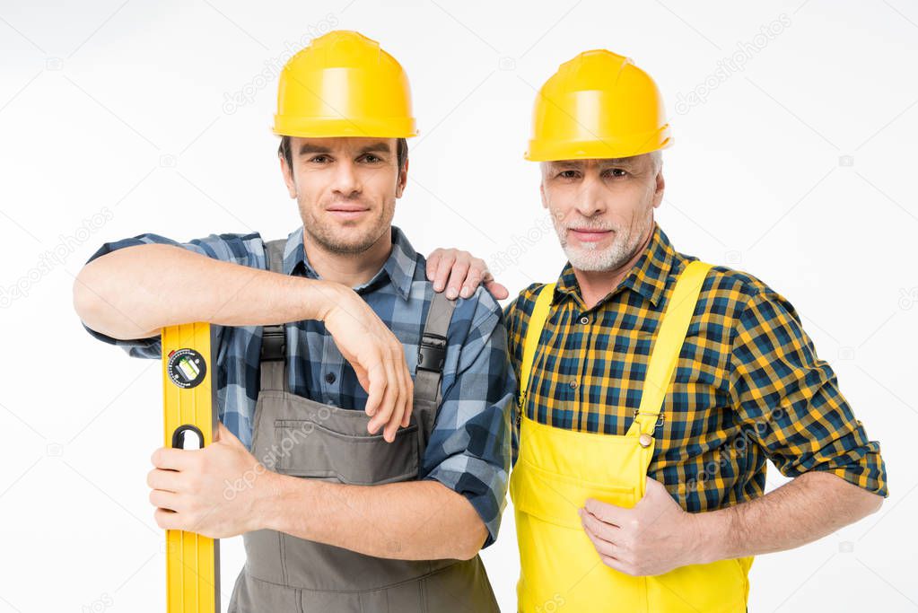 Workmen with level tool