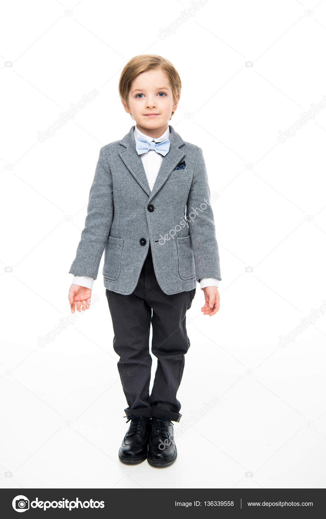 Cute little boy in suit Stock Photo by ©IgorTishenko 136339558