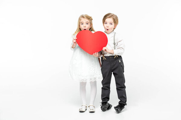 Kids holding red heart