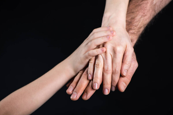 Family stacking hands