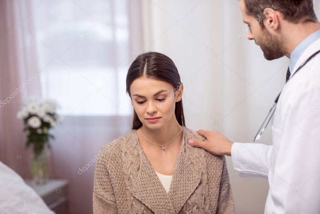 Doctor consulting patient