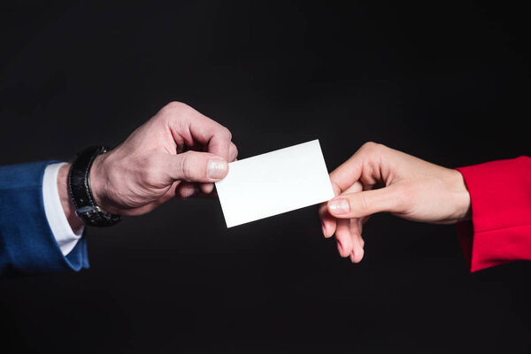 Hands holding blank card