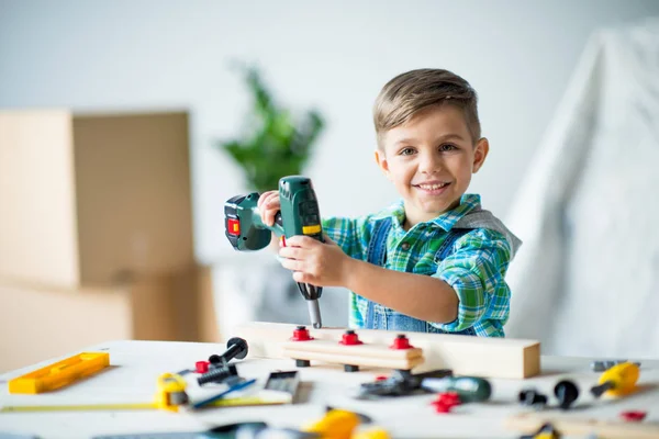 Little boy with tools — Stock Photo, Image