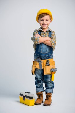 Little boy in tool belt clipart