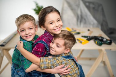 Happy kids hugging clipart