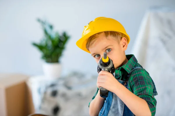 Little boy with toy drill — Stock Photo, Image