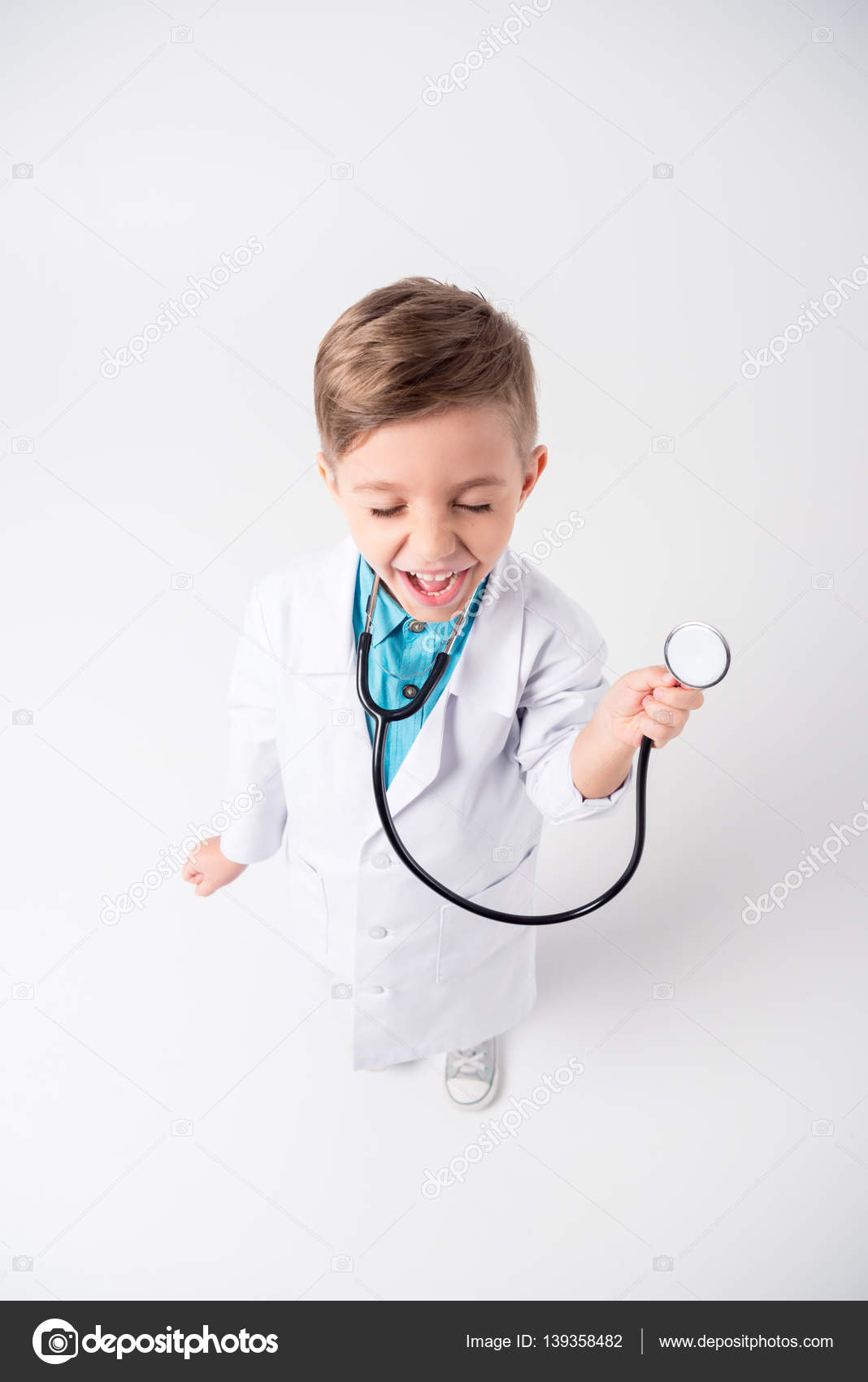 Boy in doctor costume — Stock Photo © IgorTishenko 139358482