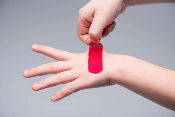Red patch on hand — Stock Photo, Image