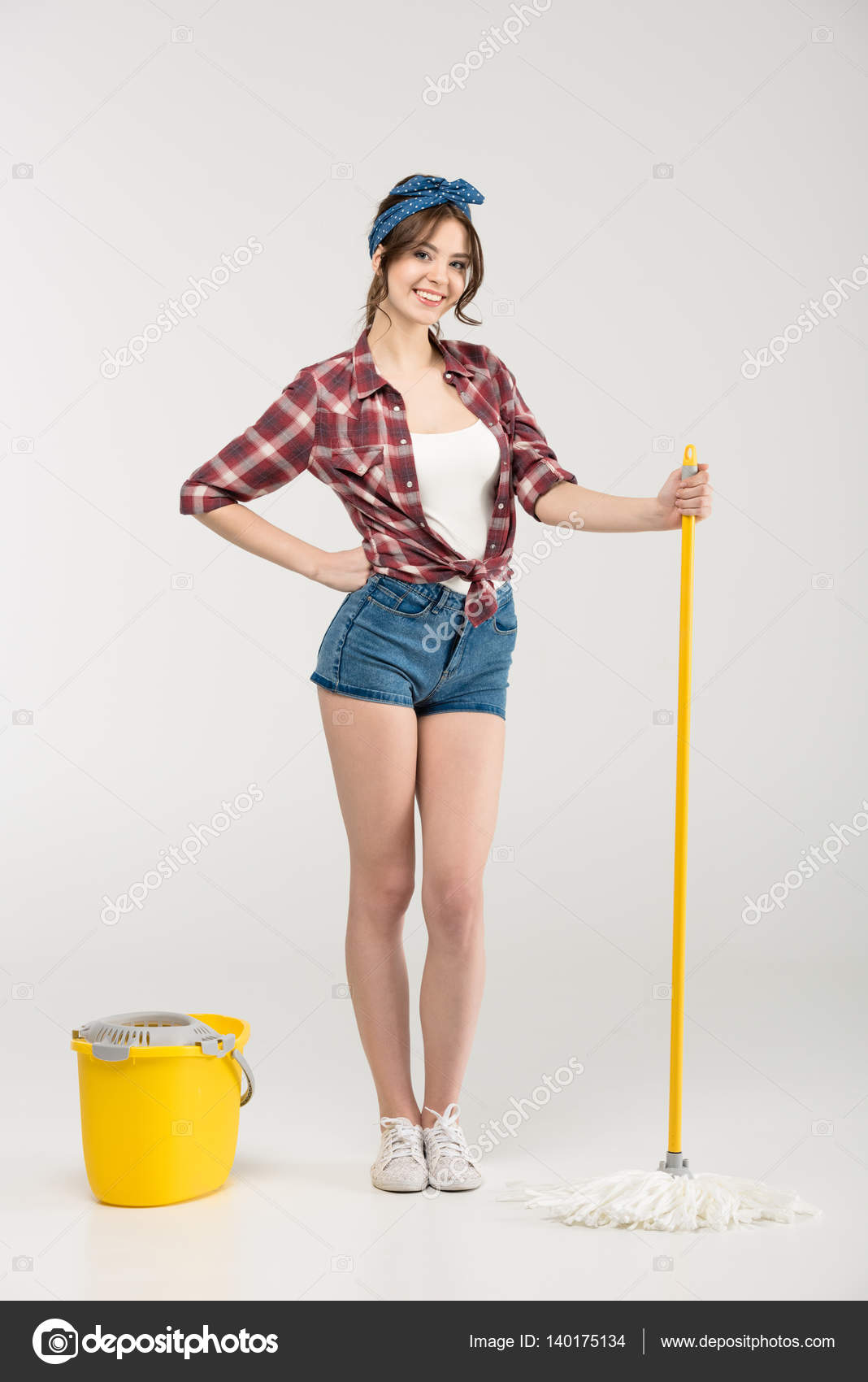 Young woman with mop Stock Photo by ©IgorTishenko 140175134