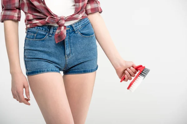 Woman with scrubbing brush — Free Stock Photo