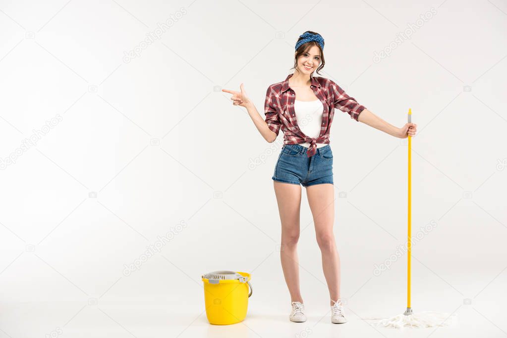 Young woman with mop