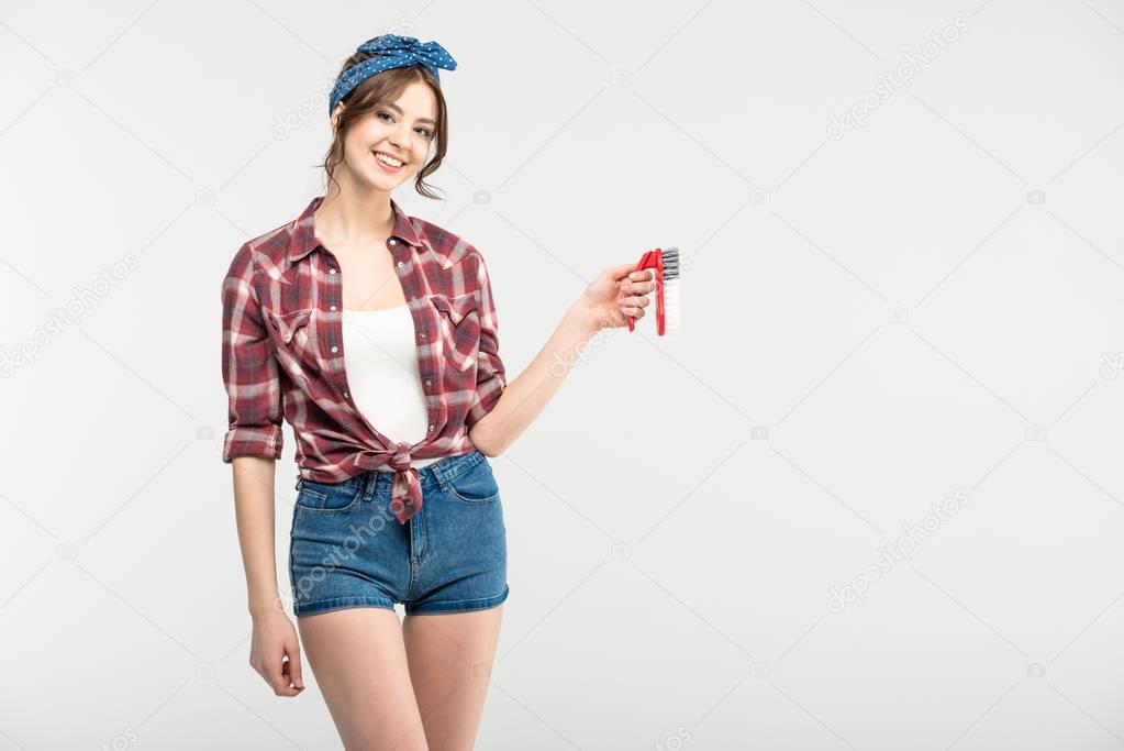 Woman with scrubbing brush