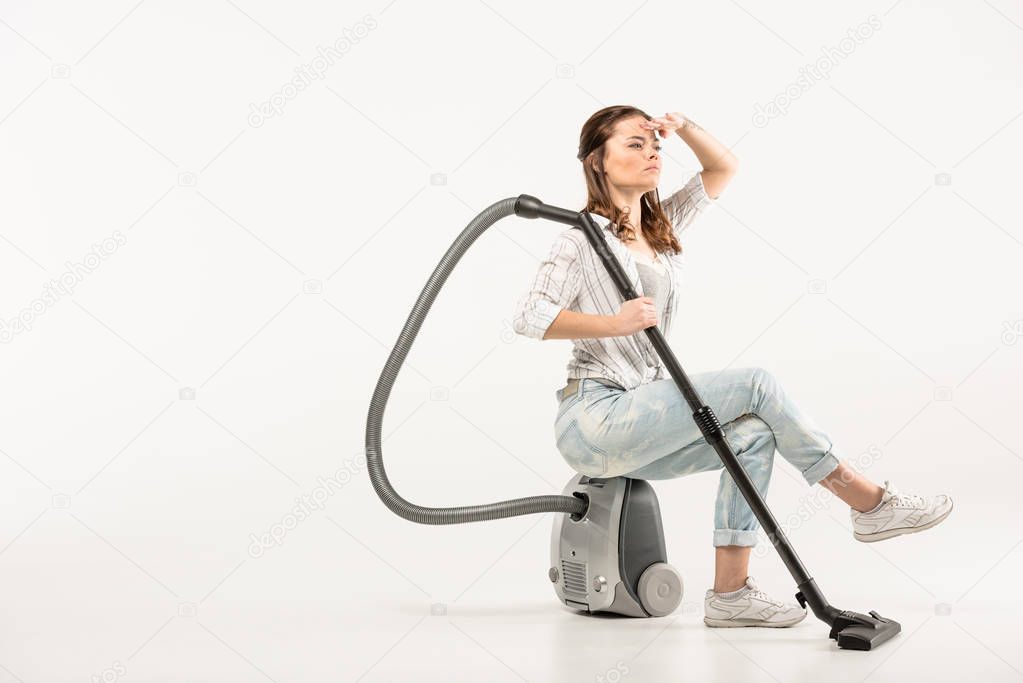 Woman with vacuum cleaner