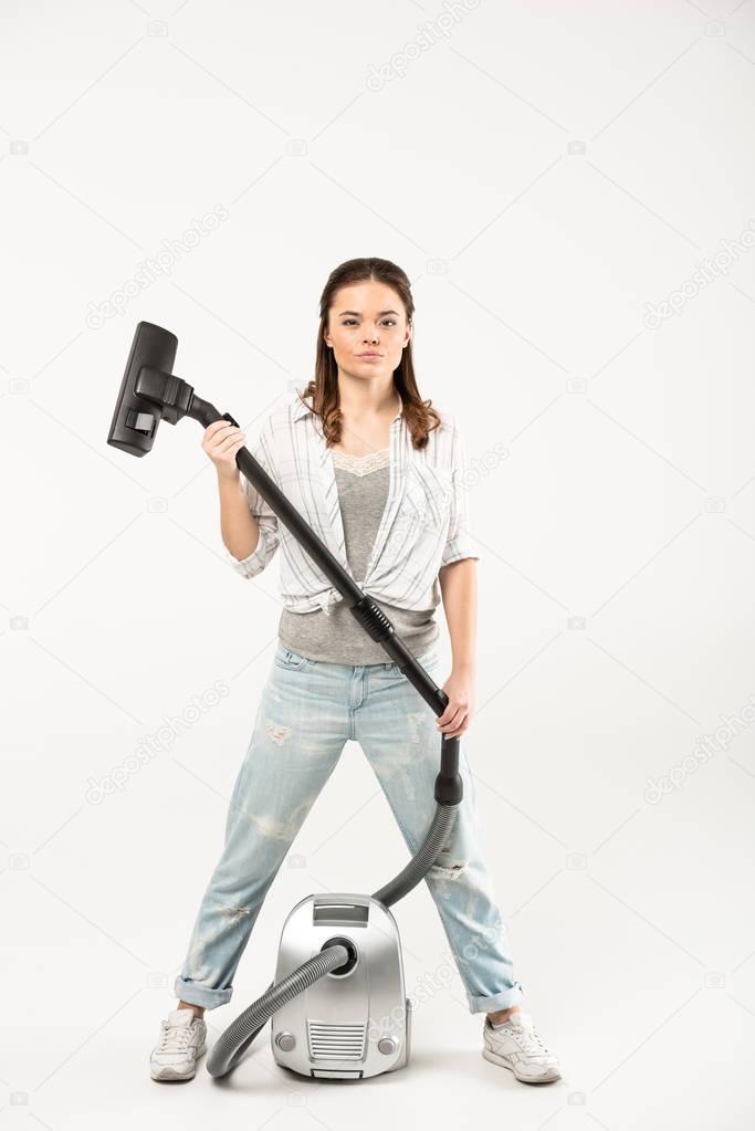 Woman with vacuum cleaner