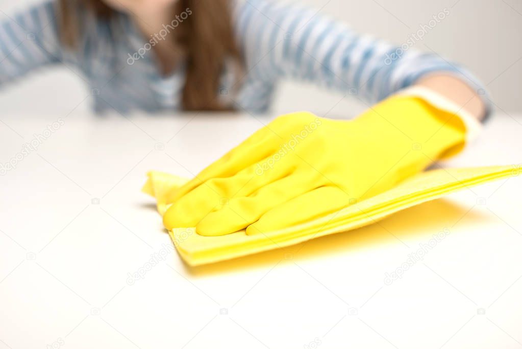 Woman cleaning surface