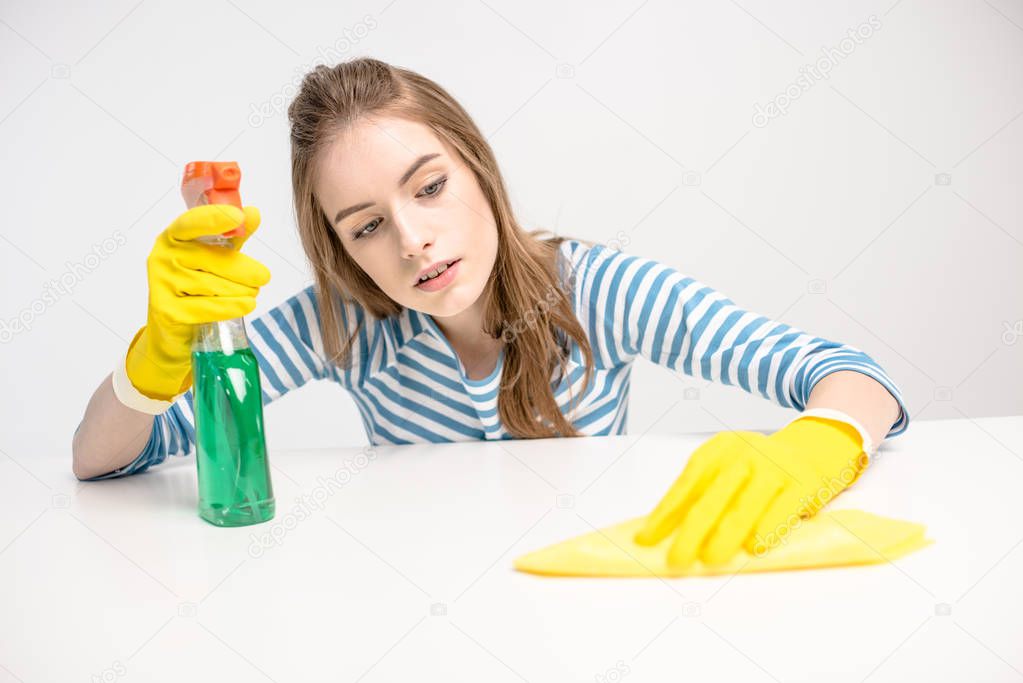 Woman cleaning surface 