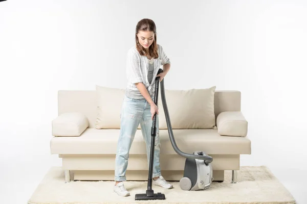 Woman vacuuming carpet — Stock Photo, Image