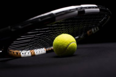 Tennis ball and racquet    clipart