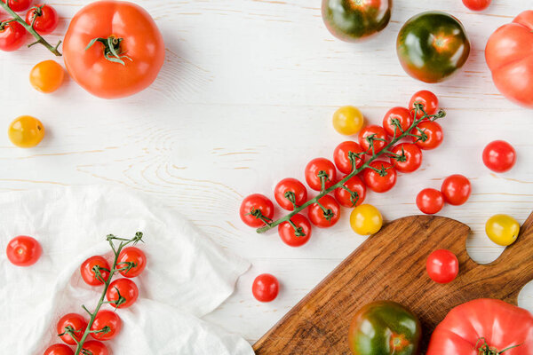 Tomatoes and cutting board