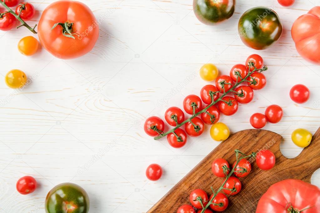 Tomatoes and cutting board