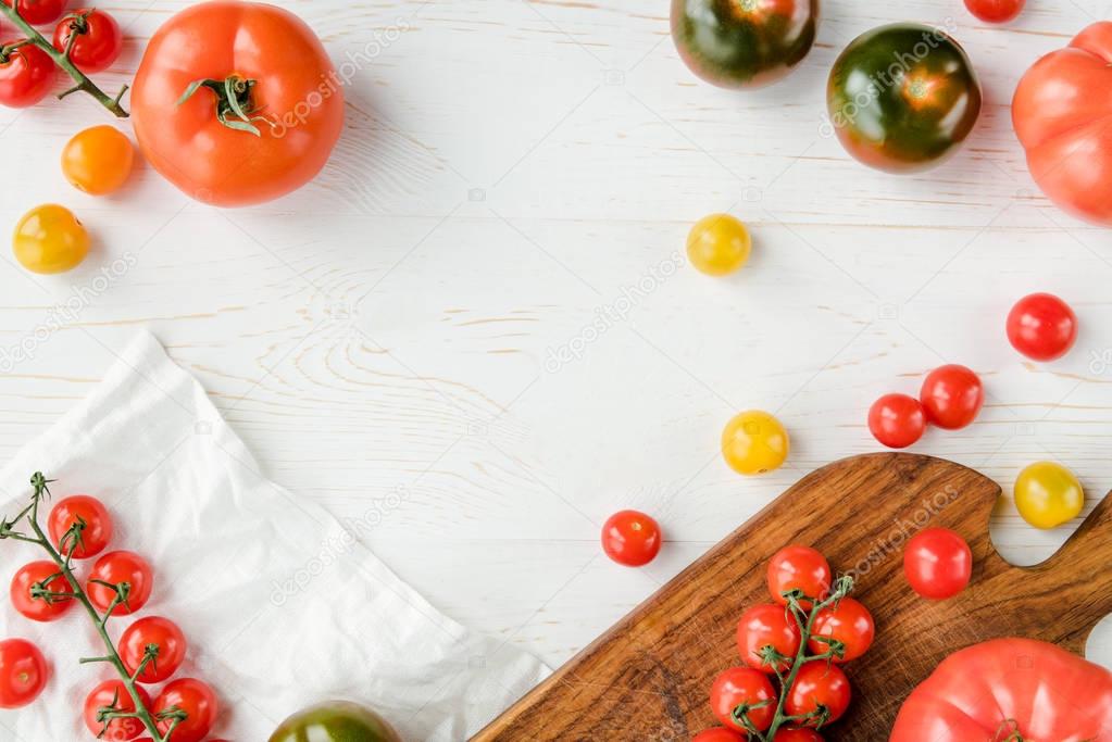 Tomatoes and cutting board