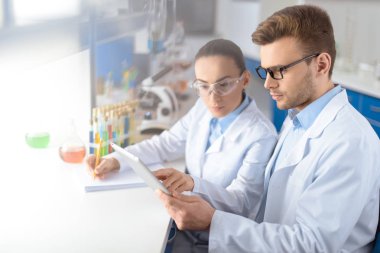 scientists working in laboratory