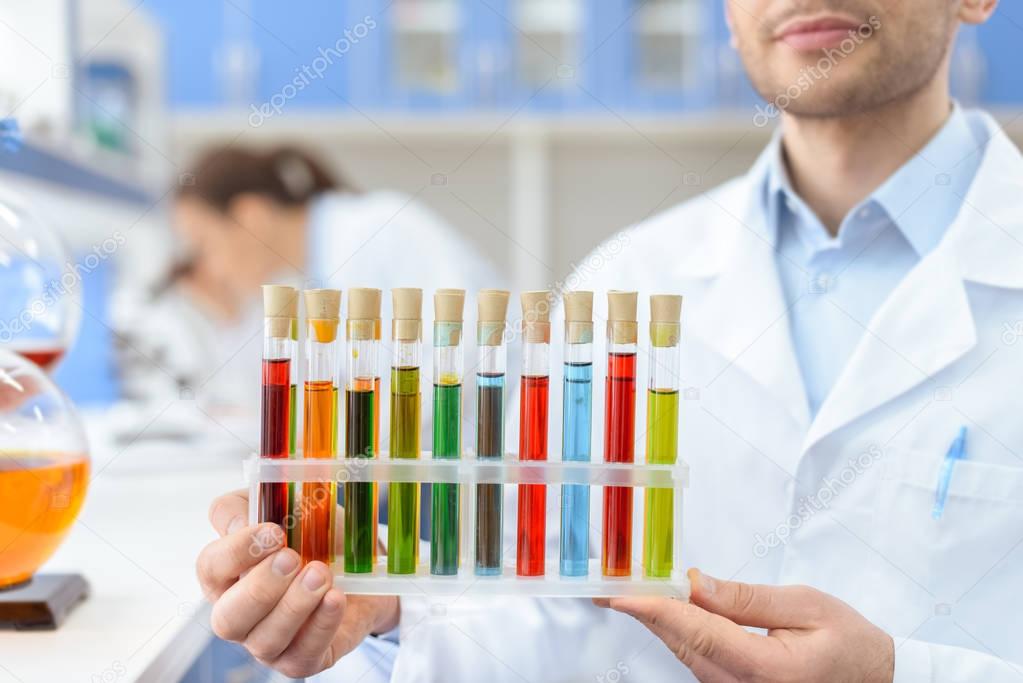 Scientist working with test tubes