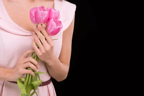 Mujer joven con tulipanes —  Fotos de Stock