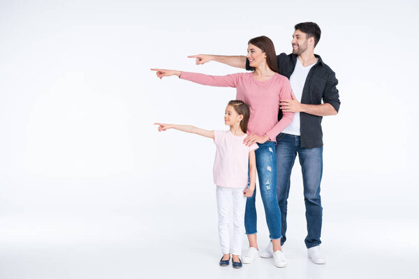 Happy family pointing