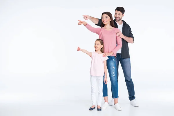 Familia feliz señalando — Foto de Stock