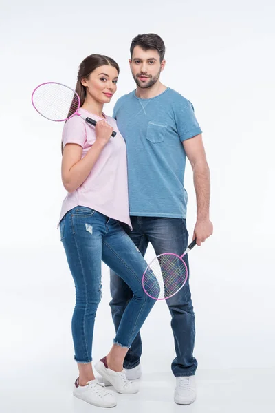 Couple with badminton rackets — Stock Photo, Image